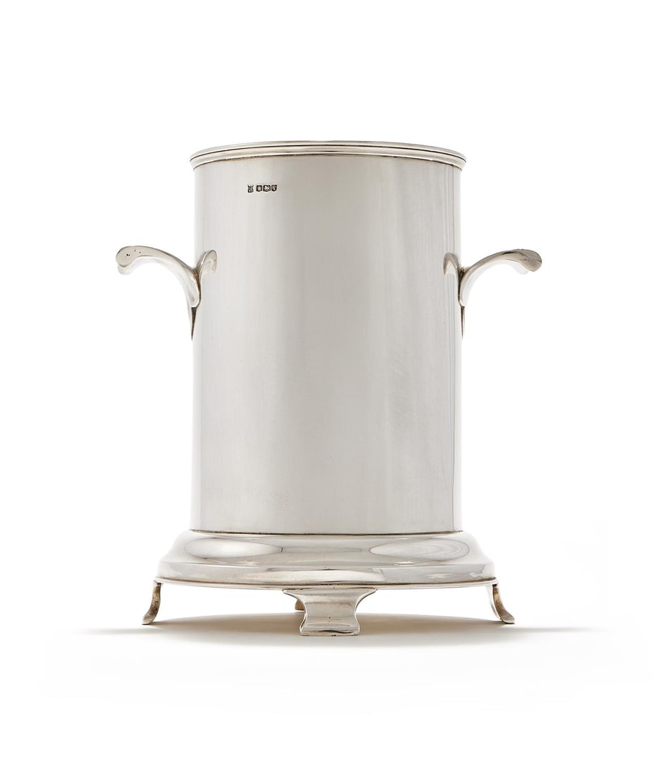 A SILVER BOTTLE HOLDER (1 of 3)