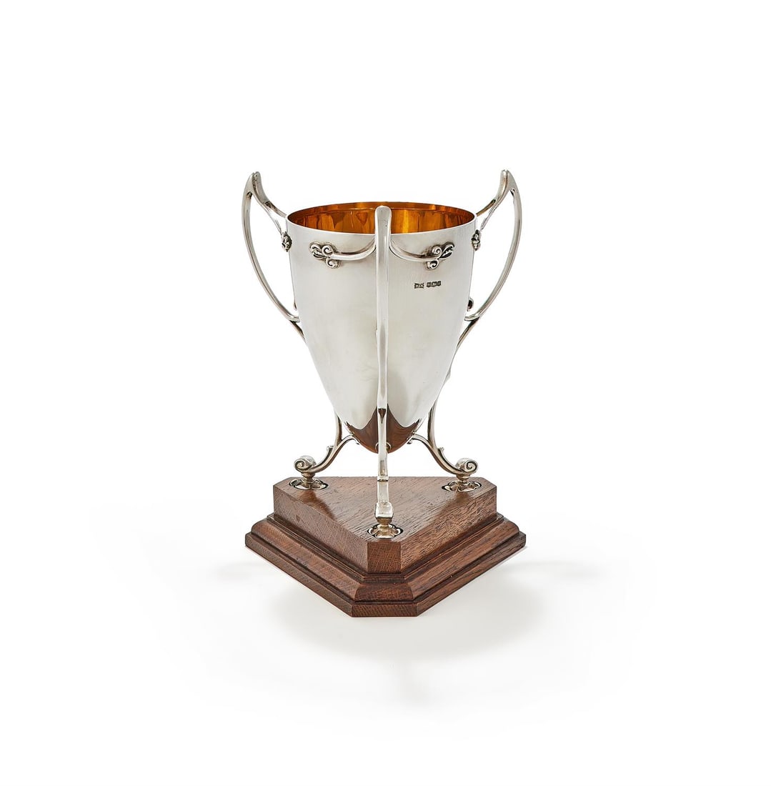 A SILVER THREE HANDLED CUP (1 of 3)