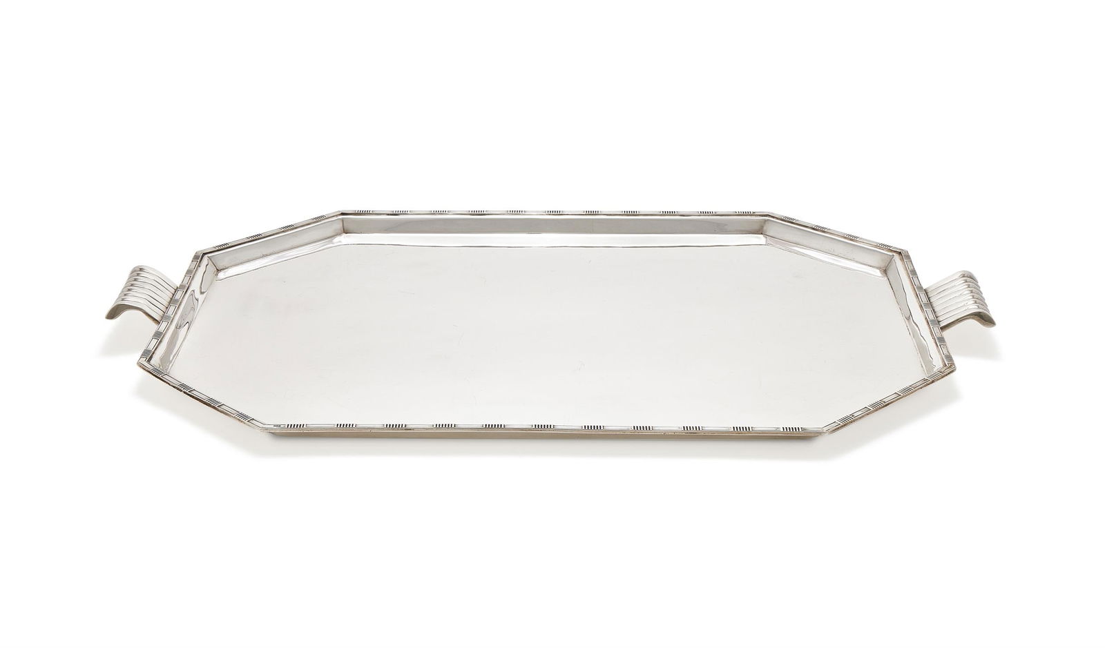 A LARGE SILVER TWIN HANDLED TRAY: A LARGE SILVER TWIN HANDLED TRAYCOOPER BROTHERS & SONS LTD., SHEFFIELD 1947 With a reeded border and twin fluted handles57.5cm long1394g (76.95 oz) Provenance:An Anglo-French Collection Of Silver