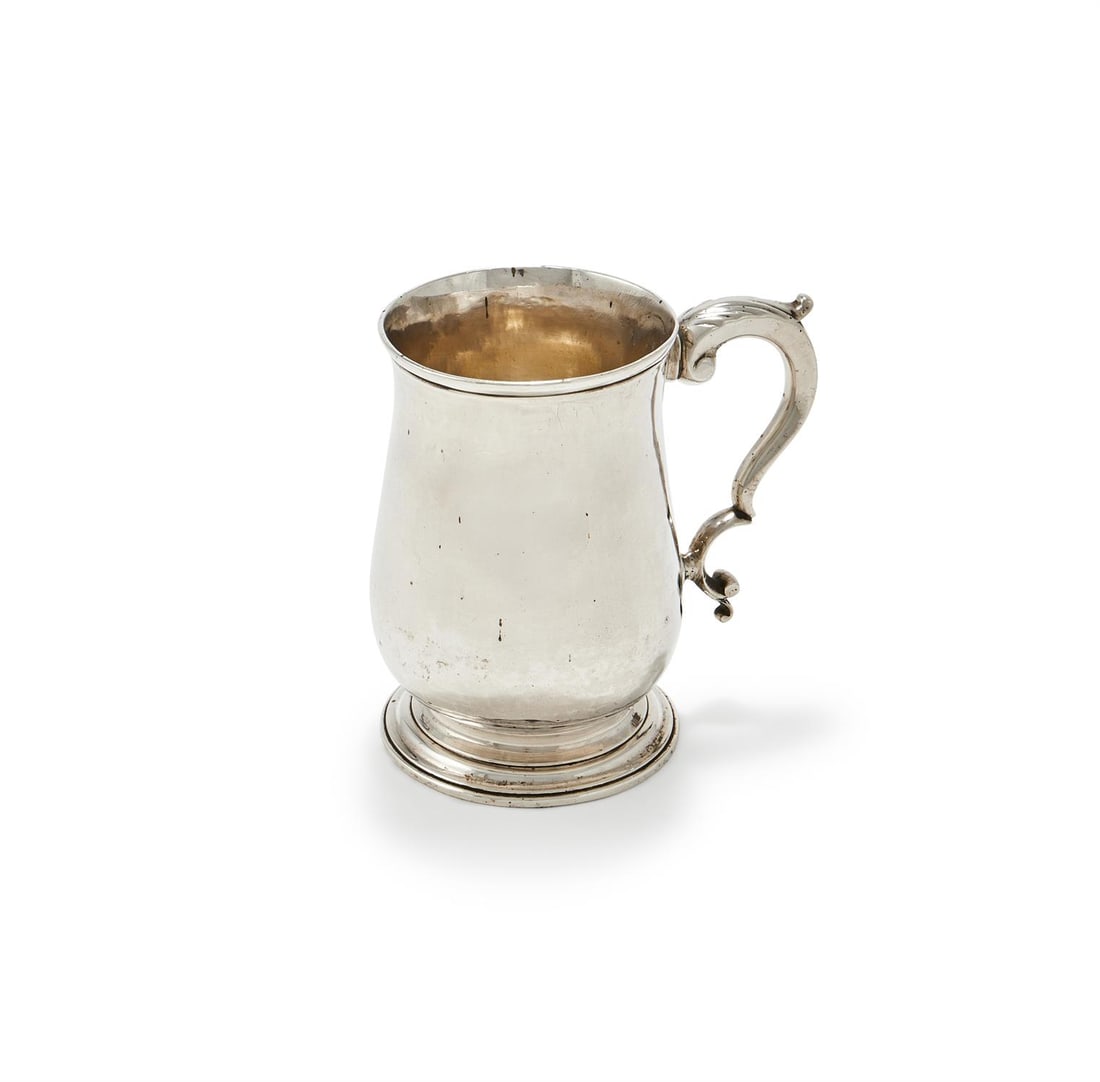 A GEORGE III SILVER BALUSTER TANKARD (1 of 2)