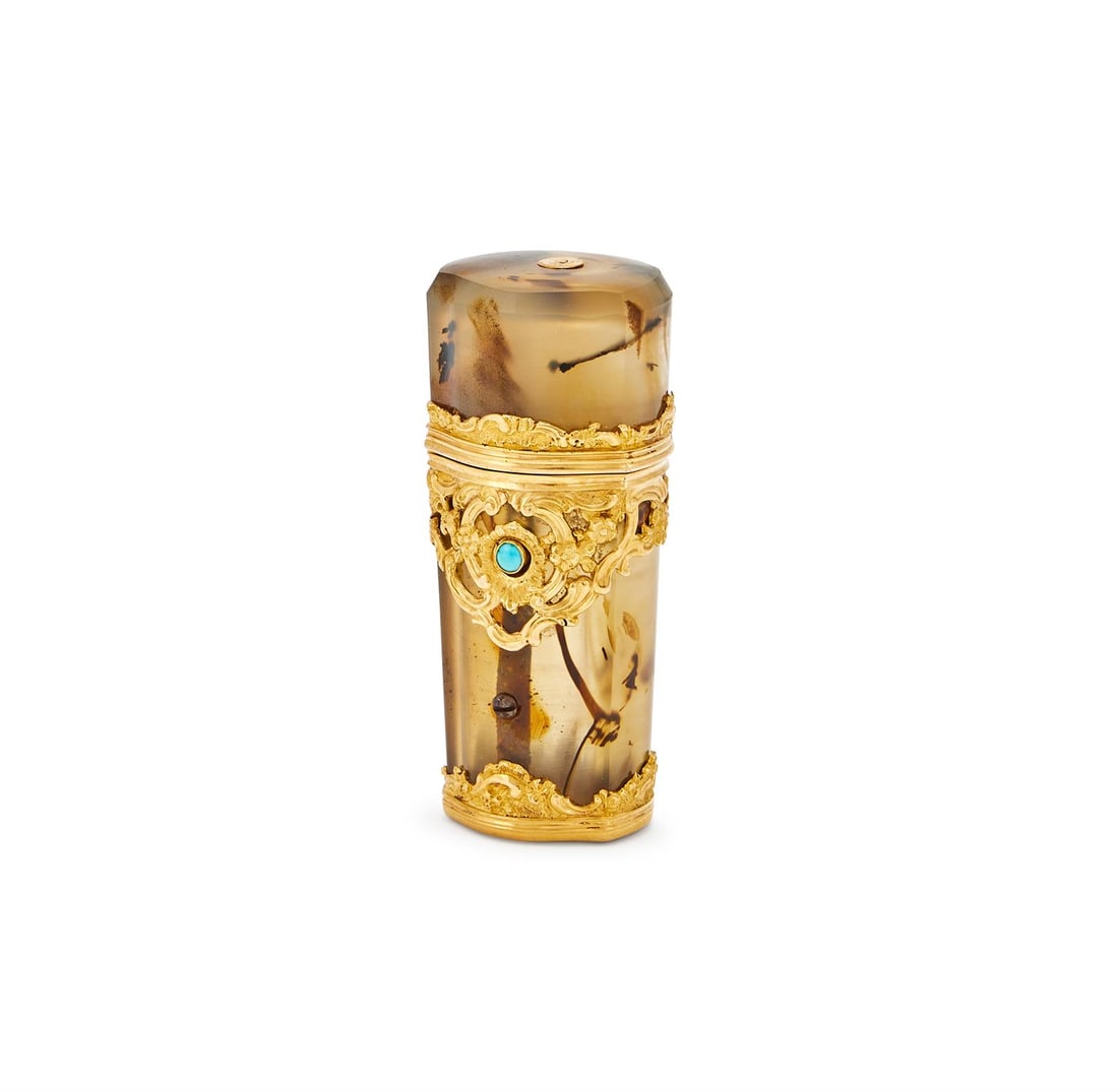 AN 18TH CENTURY GOLD AND AGATE ETUI: AN 18TH CENTURY GOLD AND AGATE ETUIUNMARKED, CIRCA 1760The facetted tapering etui with pierced gold foliate scroll mounts and a turquoise thumbpiece, the interior fittings now missing5.9cm long34.3g