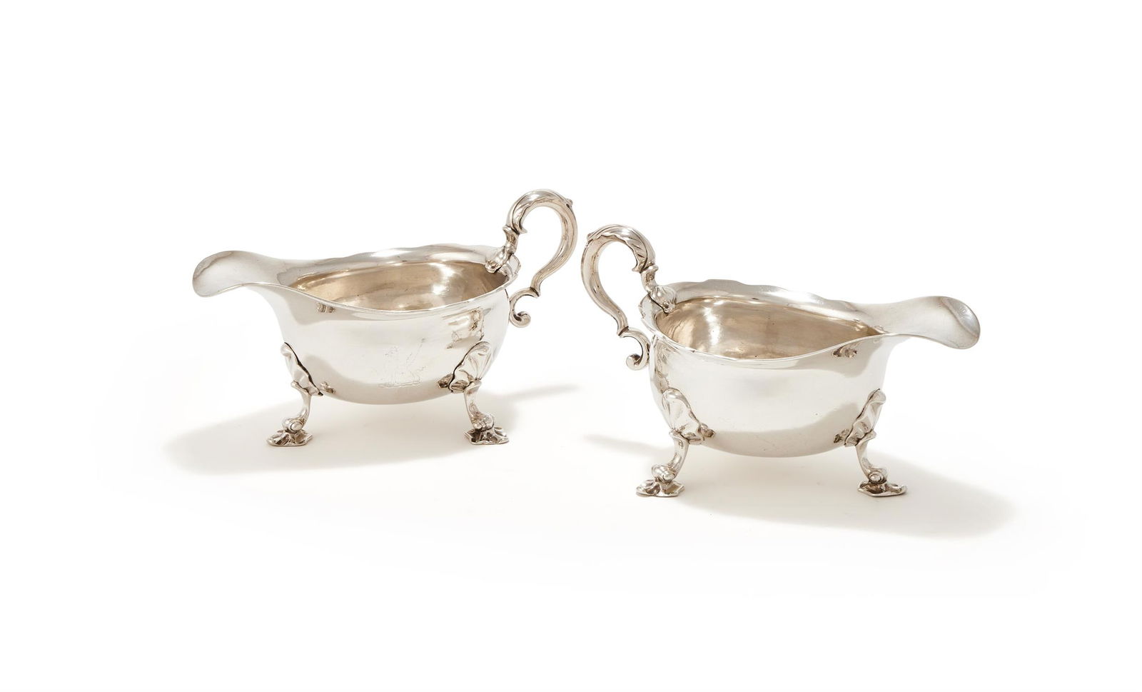 A PAIR OF GEORGE II SILVER SHAPED OVAL SAUCEBOATS (1 of 3)