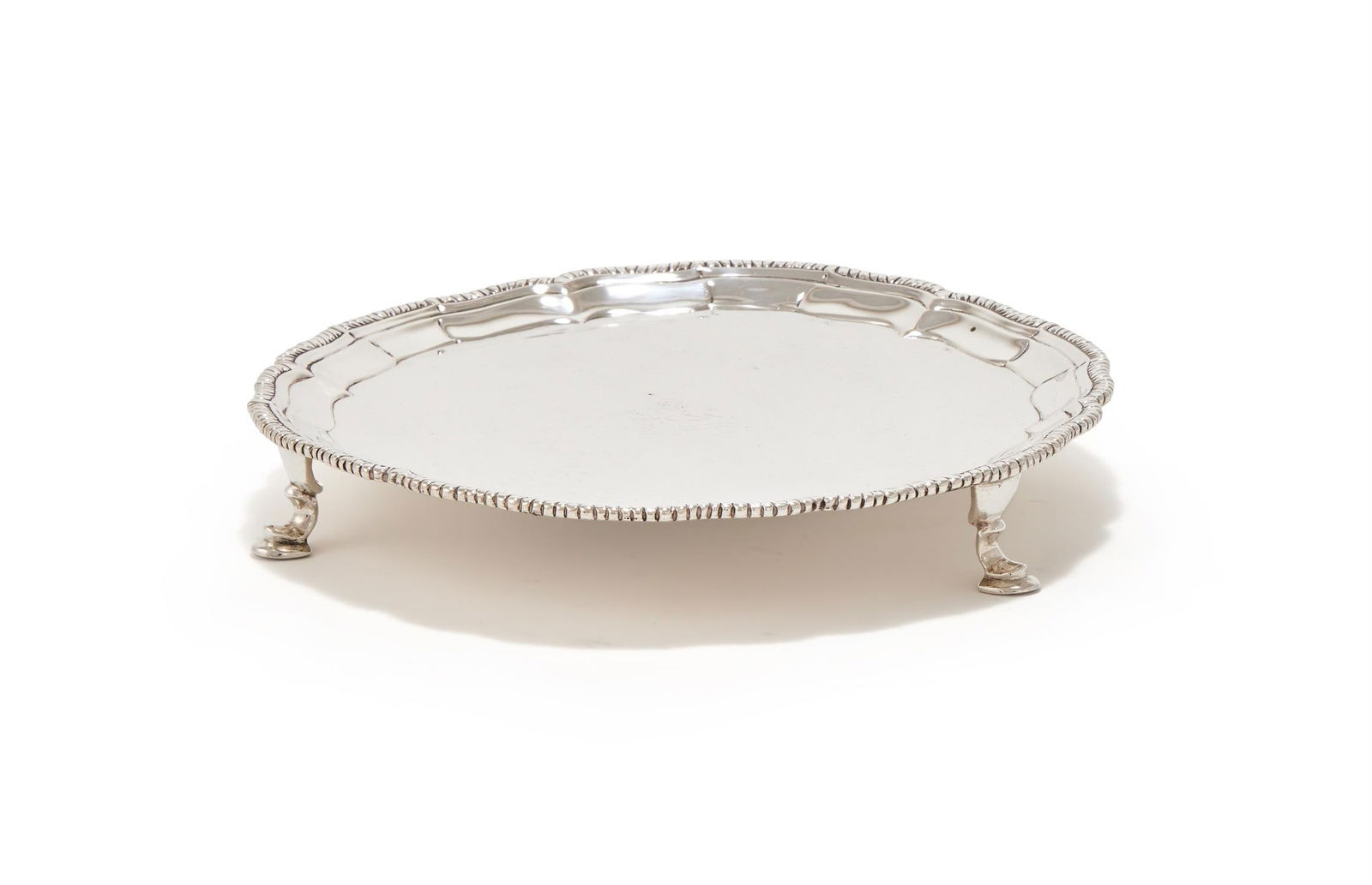 A SMALL GEORGE III SILVER SHAPED CIRCULAR SALVER (1 of 3)