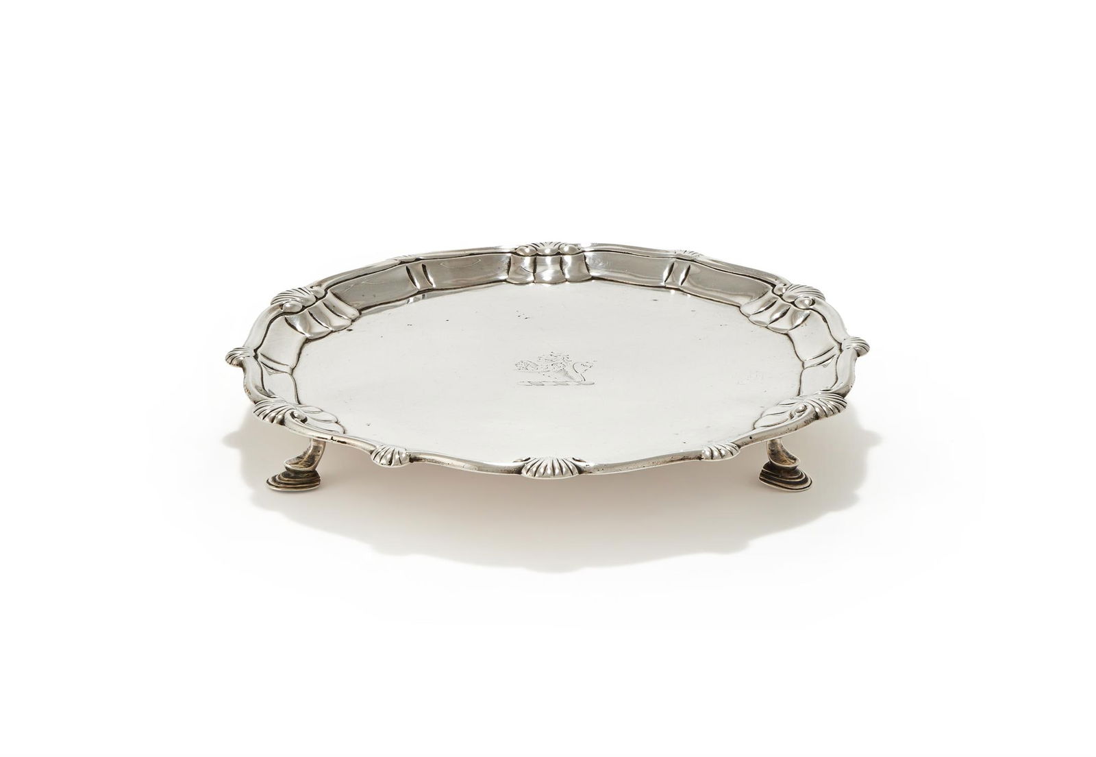 A GEORGE III SILVER SHAPED CIRCULAR WAITER (1 of 3)