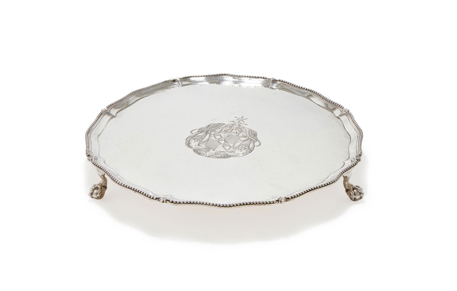 A GEORGE III SILVER CIRCULAR SALVER (1 of 3)