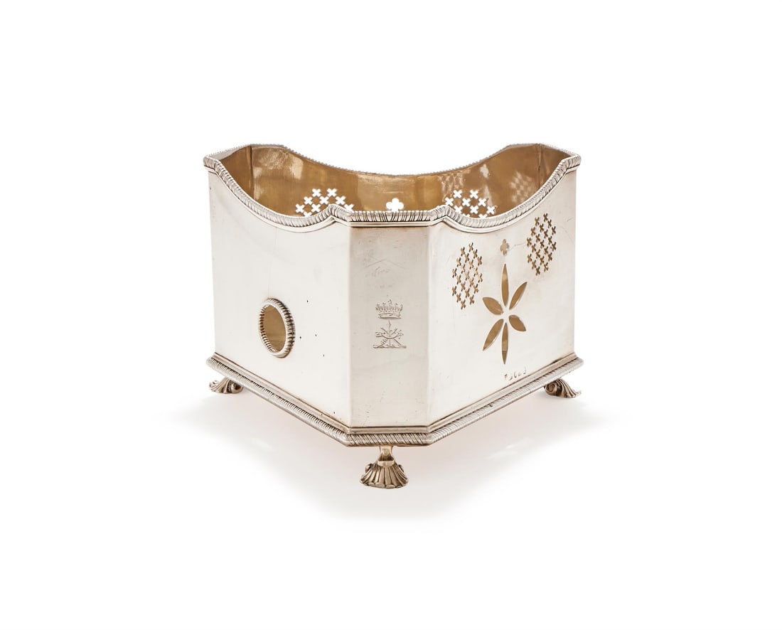 A GEORGE III SILVER TRIANGULAR STAND (1 of 3)