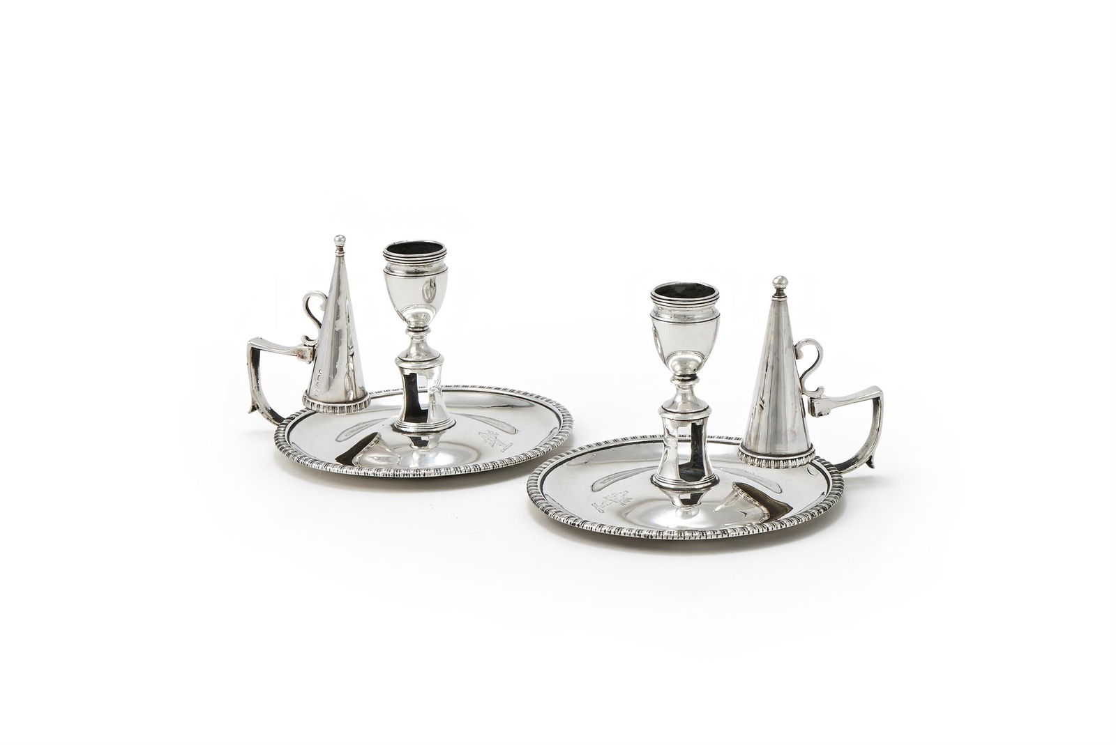 A PAIR OF GEORGE III SILVER CHAMBERSTICKS (1 of 4)