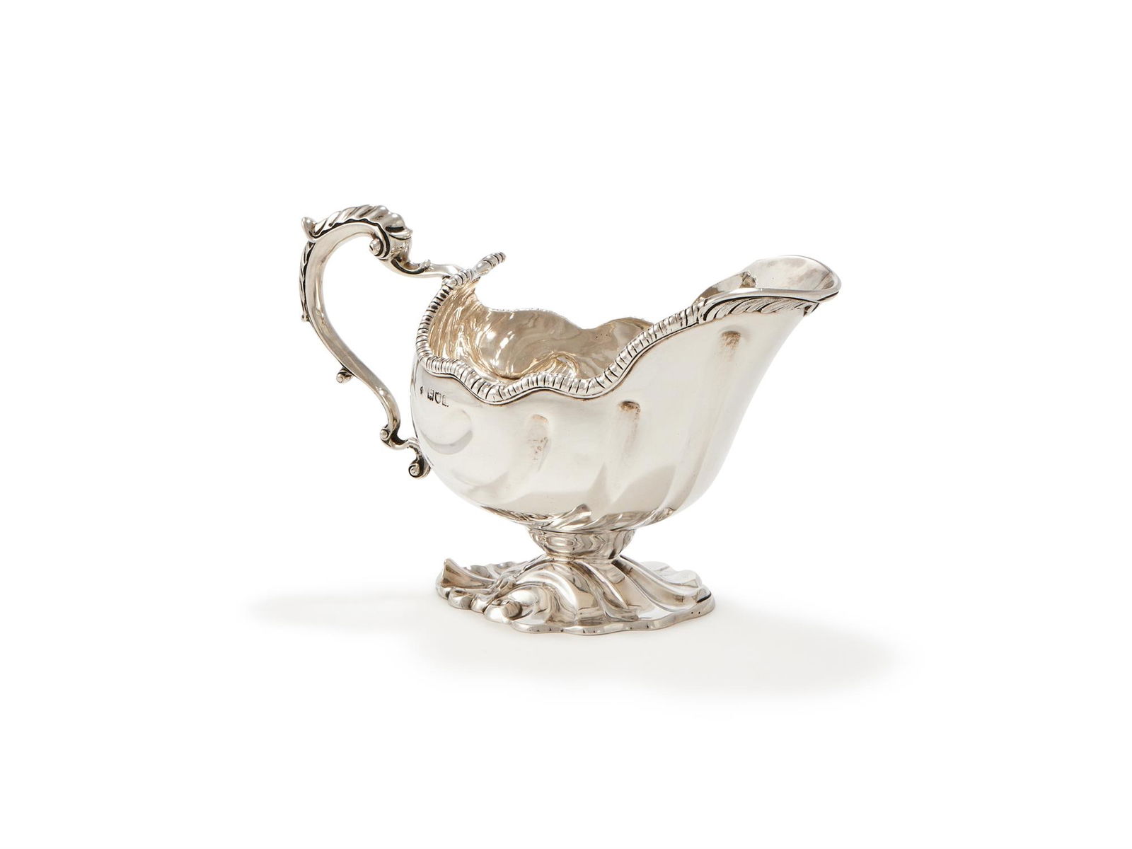 A VICTORIAN SILVER SHAPED OVAL SAUCE BOAT (1 of 2)