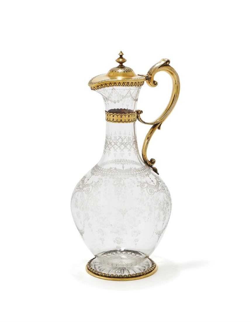 A VICTORIAN SILVER GILT MOUNTED GLASS CLARET JUG (1 of 2)
