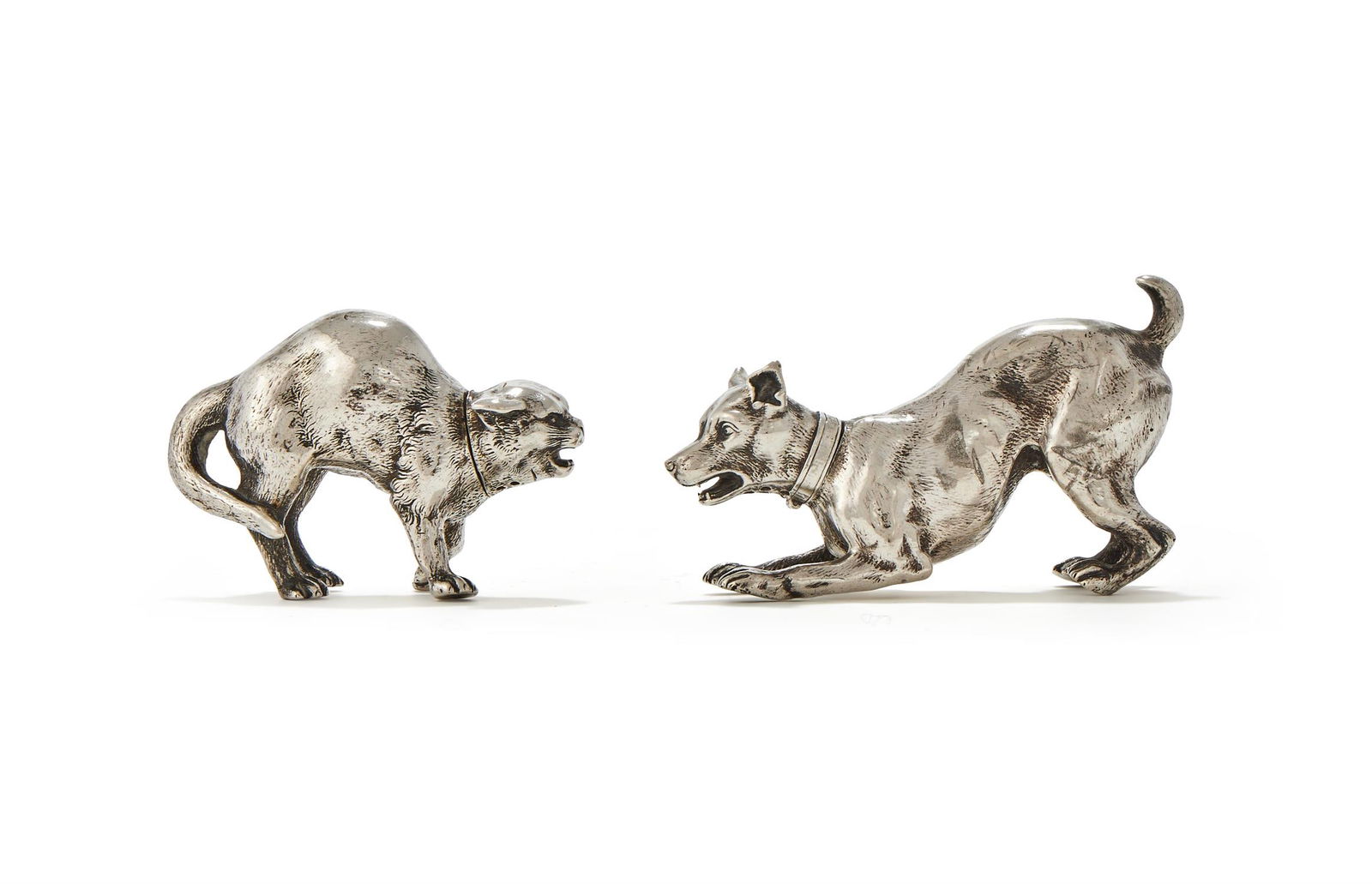A PAIR OF VICTORIAN SILVER CAT AND DOG PEPPERETTES (1 of 3)