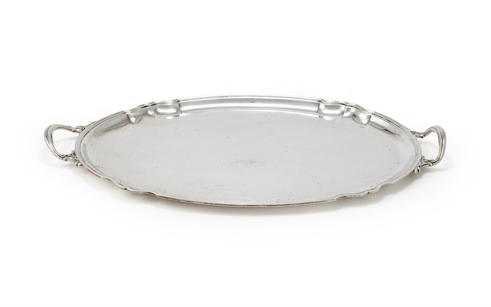 A SILVER SHAPED OVAL TWIN HANDLED TRAY (1 of 2)