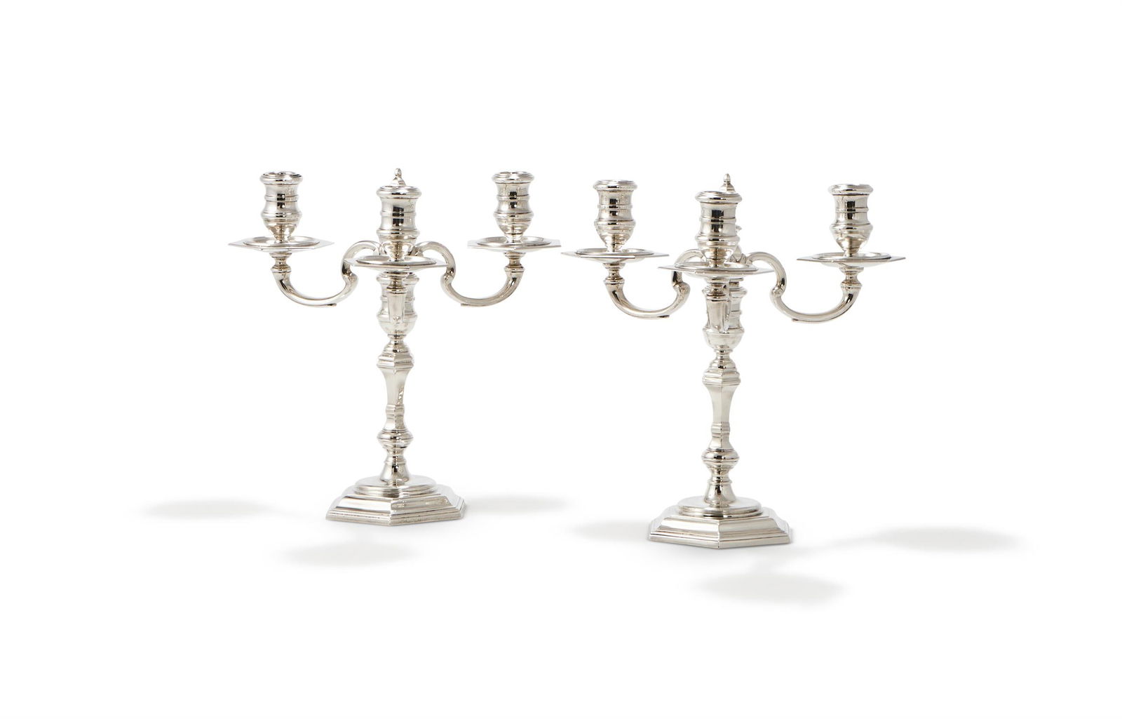 A PAIR OF CAST SILVER THREE LIGHT CANDELABRA (1 of 3)
