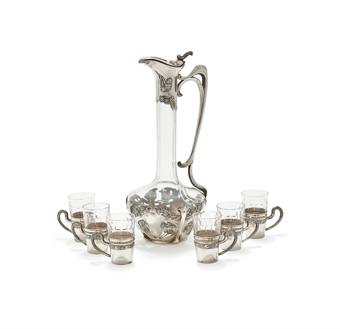 A GERMAN ART NOUVEAU SILVER MOUNTED SEVEN PIECE LIQUOUR SET (1 of 2)