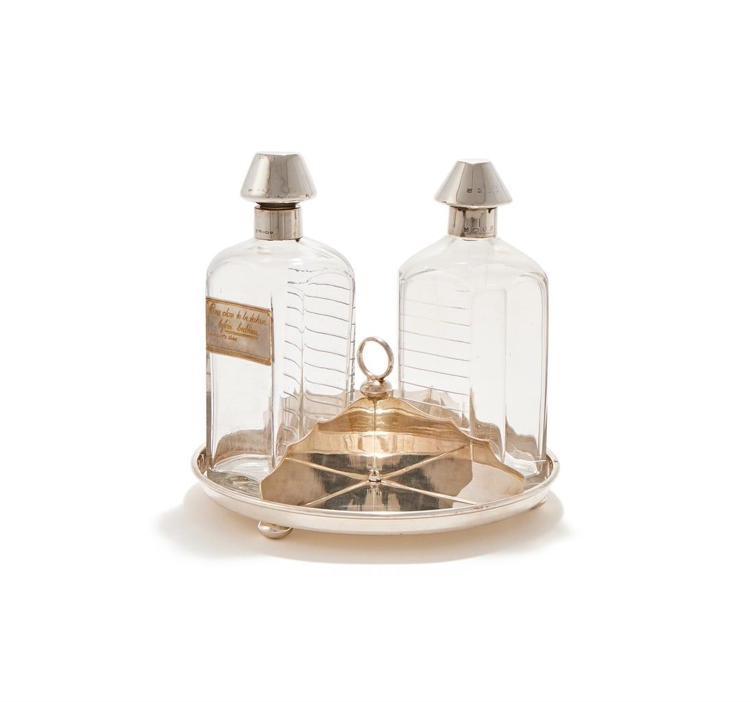 A MATCHED PAIR OF SILVER MOUNTED DECANTERS OR MEDICINE BOTTLES (1 of 2)