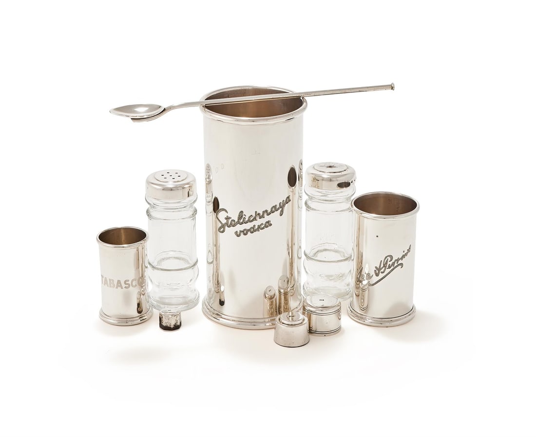 THEO FENNELL, A SILVER BLOODY MARY COCKTAIL SET: THEO FENNELL, A SILVER BLOODY MARY COCKTAIL SETLONDON 1998Comprising:A cocktail spoon, a vodka bottle holder and cover, a tabasco bottle holder and cover, a Lea & Perrins bottle holder and cover, and