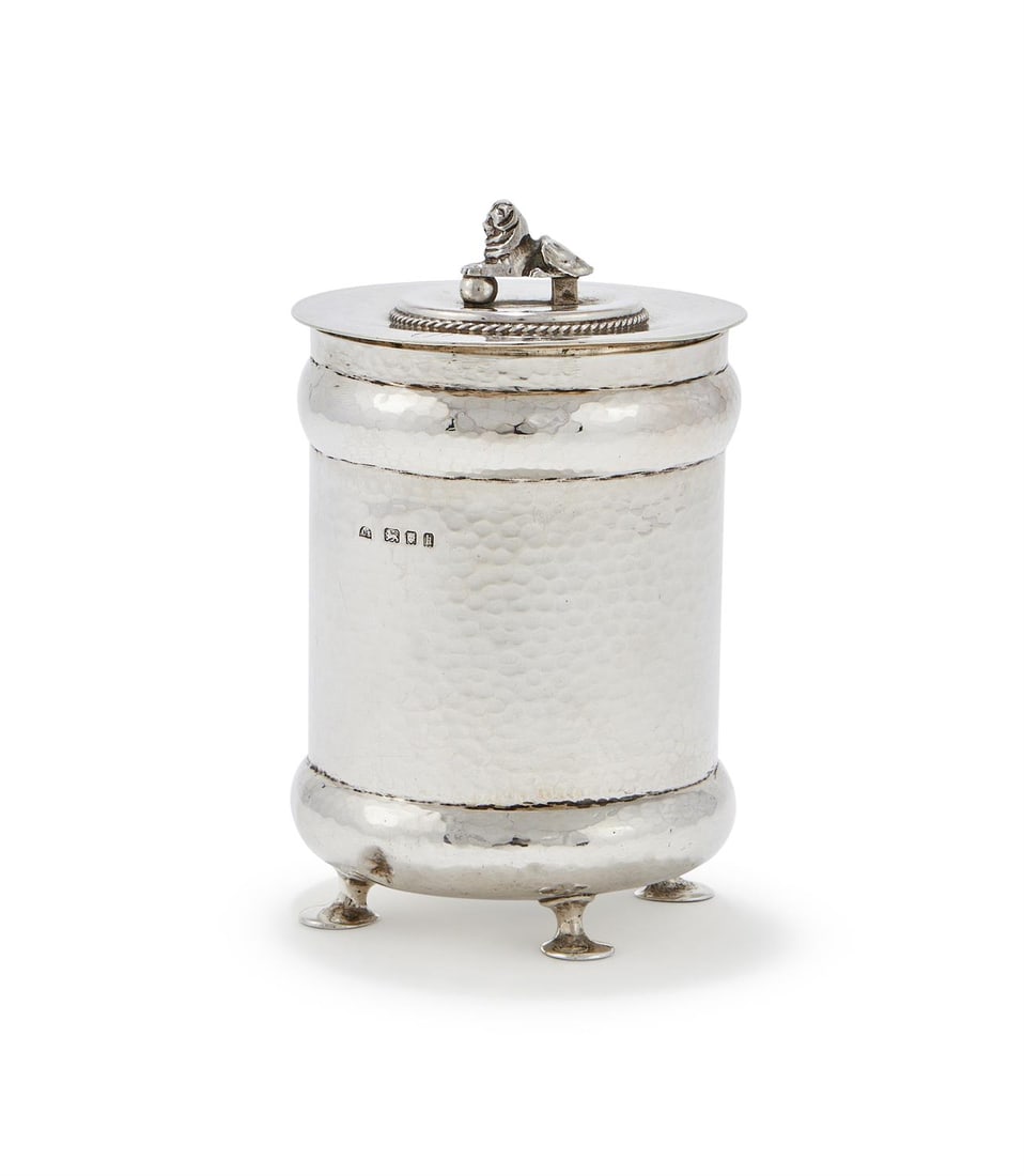 A SILVER HAMMERED JAR AND COVER (1 of 3)