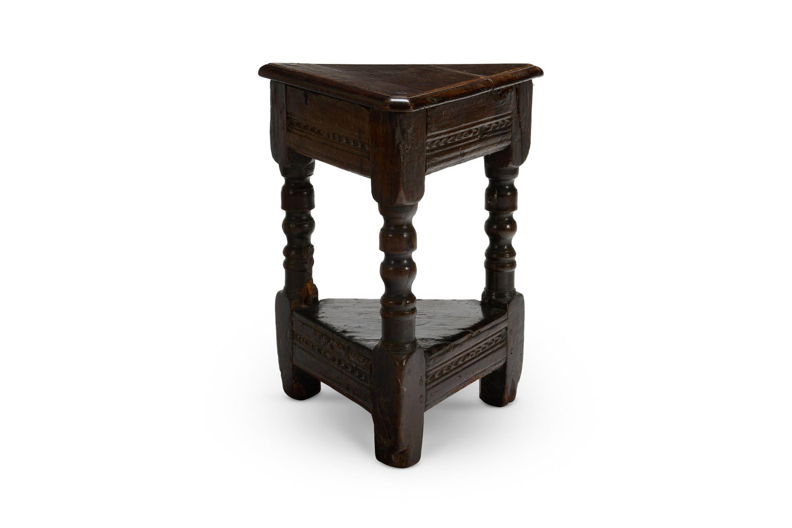 A CHARLES II OAK TRIANGULAR JOINED STOOL OR STAND, CIRCA 1670 (1 of 1)