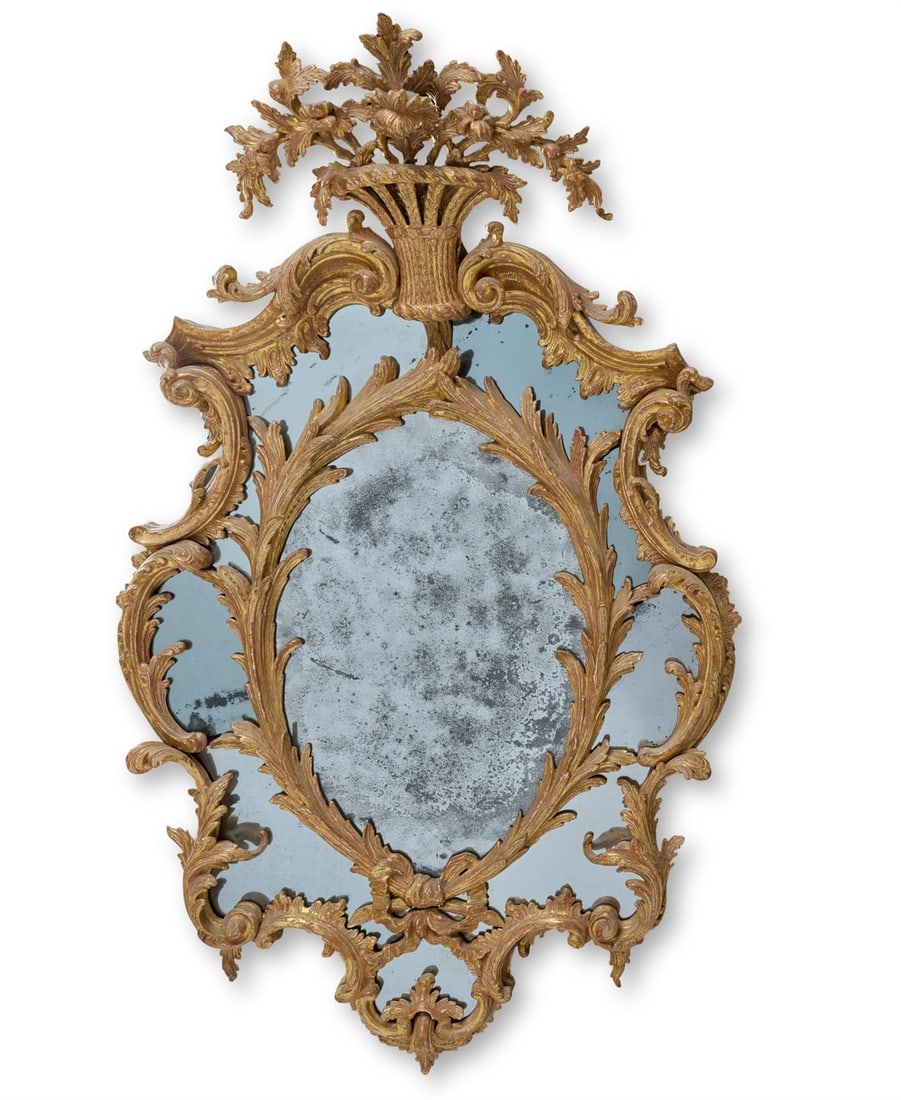 A GEORGE III CARVED GILTWOOD WALL MIRROR, CIRCA 1765 (1 of 3)