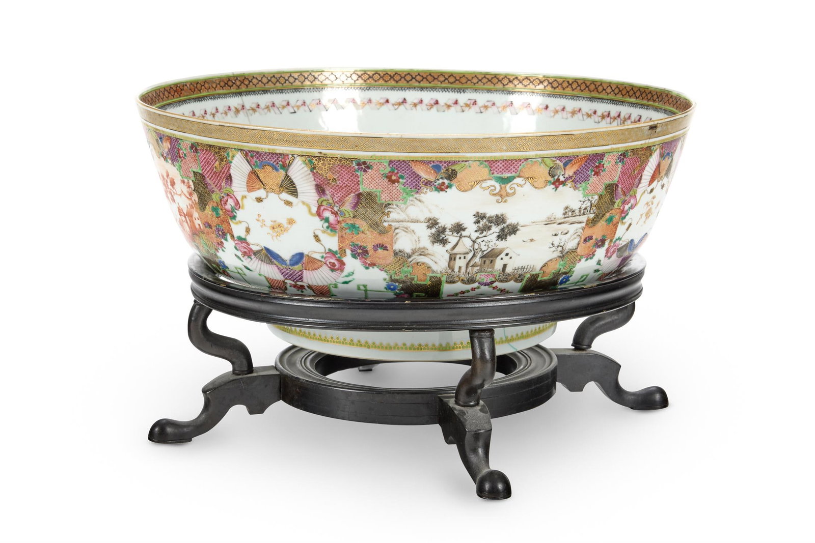 A LARGE FAMILLE ROSE PUNCH BOWL, CHINESE: A LARGE FAMILLE ROSE PUNCH BOWLCHINESE, 18TH CENTURY 36cm wide, with wood stand