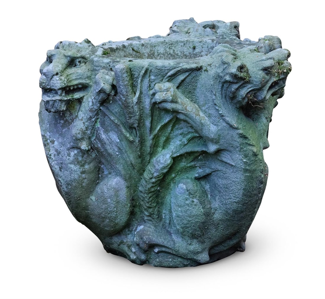 A CARVED GRITSTONE SHALLOW PLANTER OR BIRDBATH, LATE 19TH CENTURY: A CARVED GRITSTONE SHALLOW PLANTER OR BIRDBATH LATE 19TH CENTURY Carved in the round with three lions 50cm high, top 59cm wide