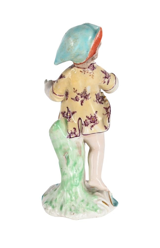 A DERBY PORCELAIN MODEL OF A CHILD PASTRY SELLER, CIRCA 1765 - 2