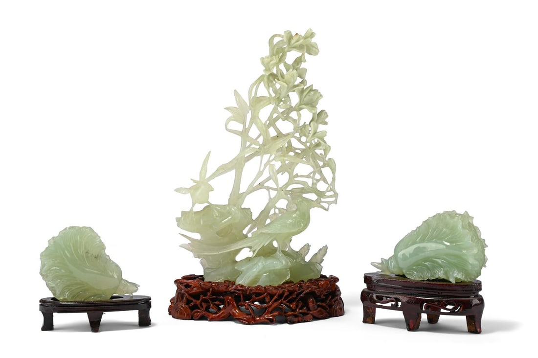 A CHINESE CARVED JADE GROUP, 20TH CENTURY, TOGETHER WITH A PAIR OF JADE CARVINGS: A CHINESE CARVED JADE GROUP WITH PHEASANT BELOW AN ARBOUR 20TH CENTURY 27cm high, 17cm wide TOGETHER WITH A pair of Chinese jade pak choi carvings, 20th century, 13cm