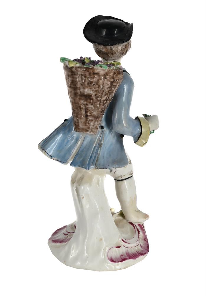 A BOW PORCELAIN MODEL OF A BOY EMBLEMATIC OF AUTUMN FROM A SERIES OF THE FOUR SEASONS, CIRCA 1760 - 2