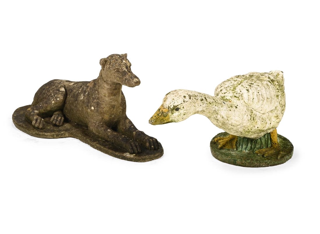 A PAINTED CAST STONE GOOSE, LATE 20TH CENTURY, AND A CAST STONE FIGURE OF A RECUMBENT DOG: A PAINTED CAST STONE GOOSE LATE 20TH CENTURY 31cm high TOGETHER WITH A cast stone figure of a recumbent dog, 68cm long Condition Report: PLEASE NOTE: ALL LOTS