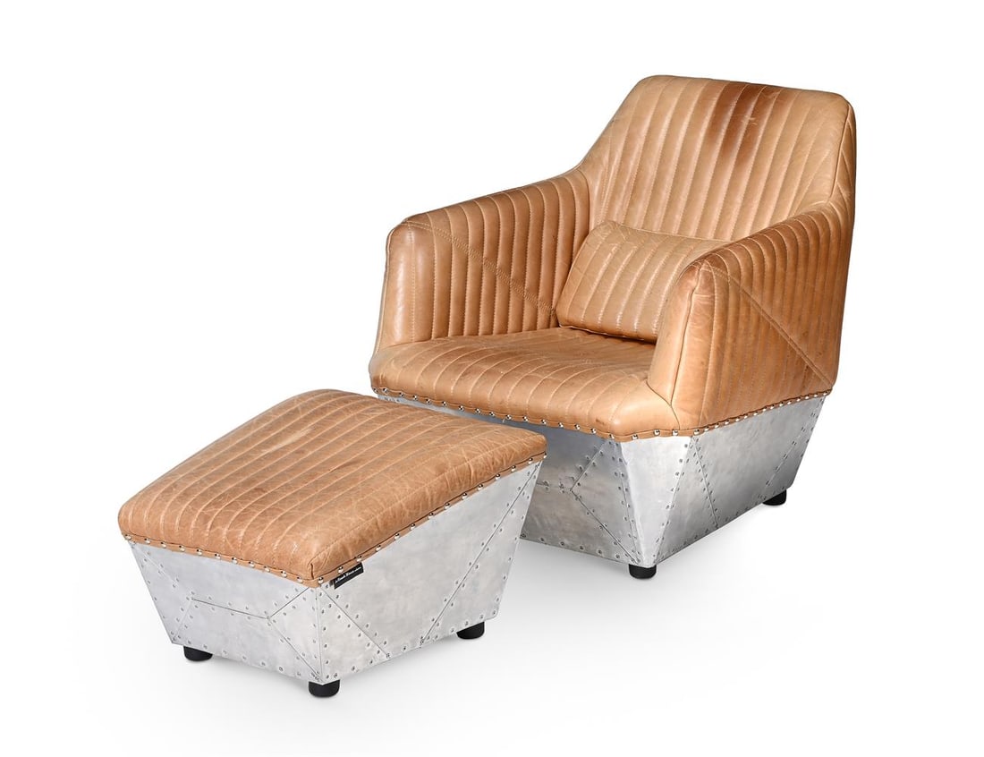 AN AVIATOR STYLE ARMCHAIR AND OTTOMAN, 21ST CENTURY/MODERN: AVIATOR STYLE ARMCHAIR AND OTTOMAN 21ST CENTURY/MODERN Ribbed light-brown leather, aviator style aluminium cladding to lower part of chair and ottoman Chair: 76cm high, 63.5cm