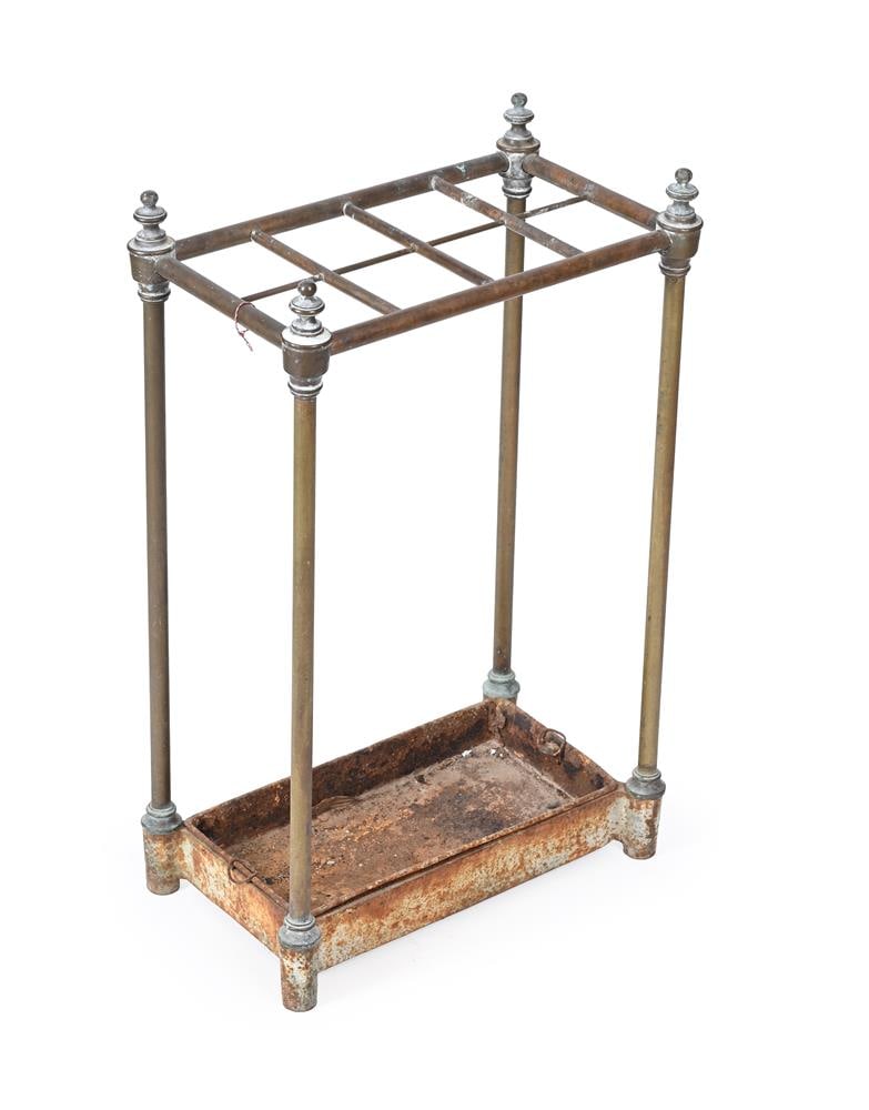 A BRASS AND IRON STICKSTAND, LATE 19TH CENTURY: A BRASS AND IRON STICKSTAND LATE 19TH CENTURY Four division top 61cm high, base 38cm wide Condition Report: PLEASE NOTE: ALL LOTS ARE LOCATED AT SACKVILLE WEST