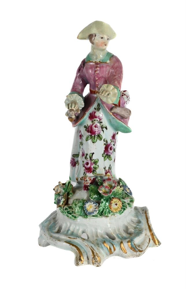 A BOW MODEL OF A SPORTSWOMAN, CIRCA 1765: A BOW PORCELAIN MODEL OF A SPORTSWOMAN