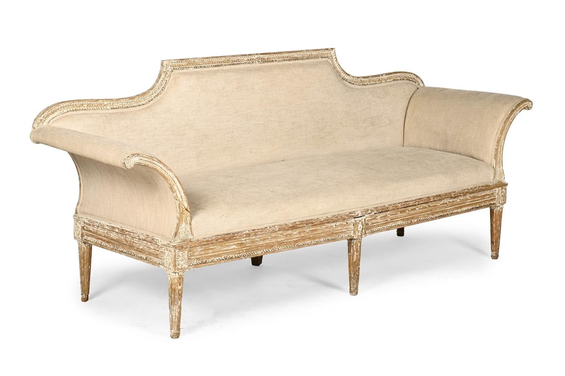 A CREAM BRUSHED LINEN STUFF OVER UPHOLSTERED SETEE, IN LOUIS XVI STYLE, CIRCA 1895: A CREAM BRUSHED LINEN STUFF OVER UPHOLSTERED SETEE IN LOUIS XVI STYLE, CIRCA 1895 With distressed painted finish 95cm high, 238cm wide, 67cm deep, seat height 46cm 