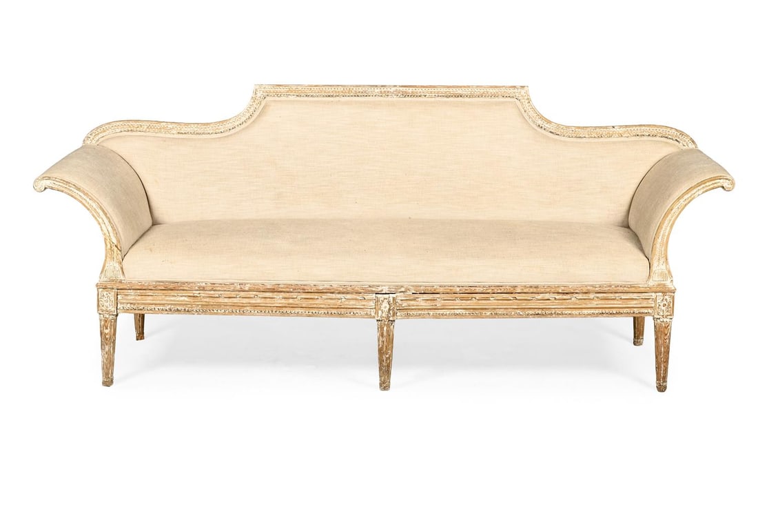 A CREAM BRUSHED LINEN STUFF OVER UPHOLSTERED SETEE, IN LOUIS XVI STYLE, CIRCA 1895 - 2