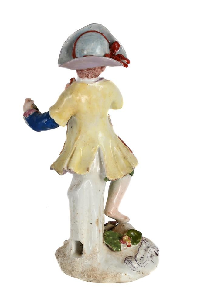 A BOW PORCELAIN MODEL OF A BOY EMBLEMATIC OF AUTUMN FROM A SERIES OF THE FOUR SEASONS, CIRCA 1765 - 2