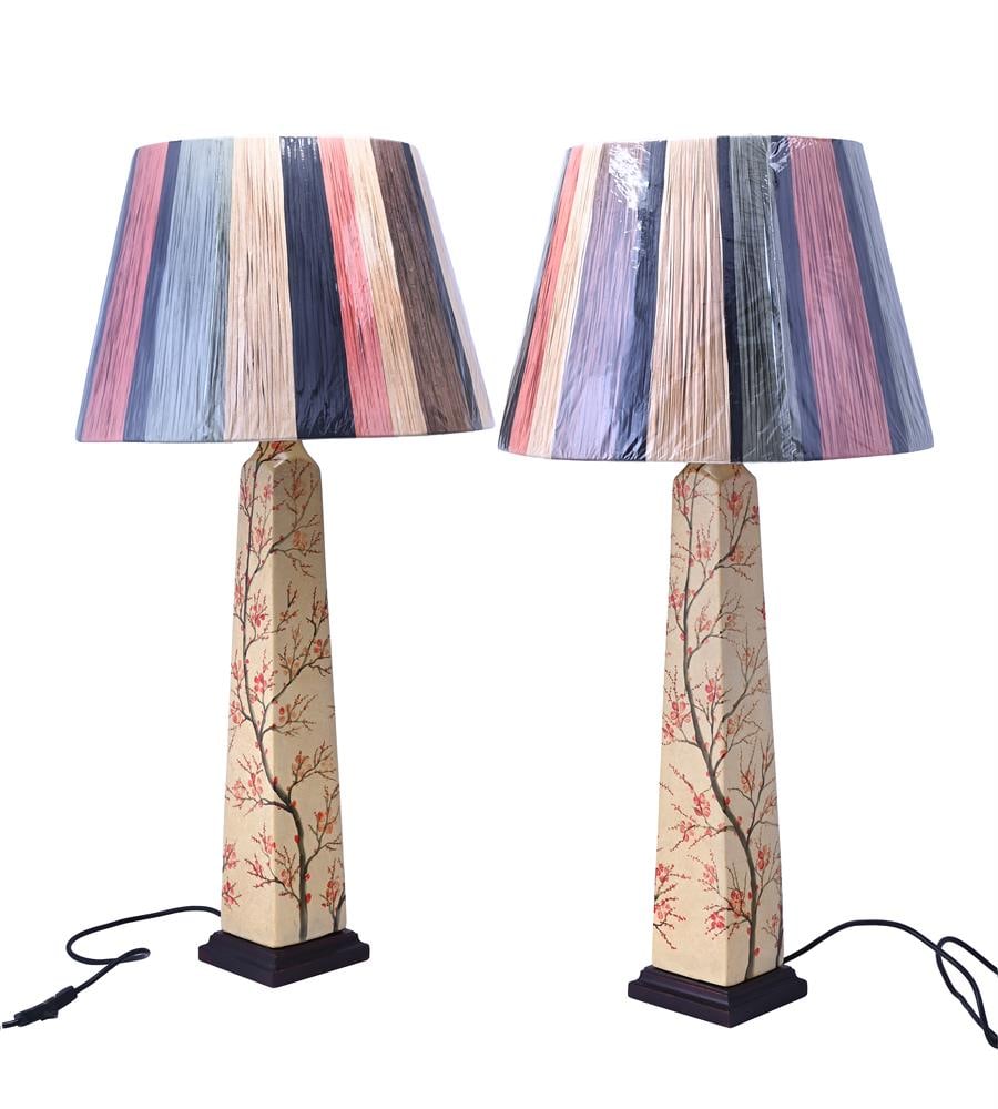 A PAIR OF TALL HAND PAINTED OBELISK FORM POTTERY TABLE LAMPS WITH OKA SHADES, MODERN: A PAIR OF TALL HAND PAINTED OBELISK FORM POTTERY TABLE LAMPS MODERN The bases hand painted with cherry blossom , fitted brand new striped OKA 'Bridget' lampshades each 88cm