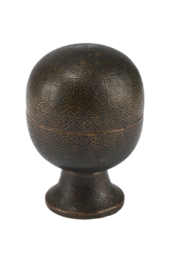 A COPPER OVAL BOX AND COVER, PERSIAN, 18TH CENTURY: A COPPER OVAL BOX AND COVER PERSIAN, 18TH CENTURY With applied motif 11cm high, 7.5cm diameter Condition Report: PLEASE NOTE: ALL LOTS ARE LOCATED AT SACKVILLE WEST STORAGE IN ANDOVER