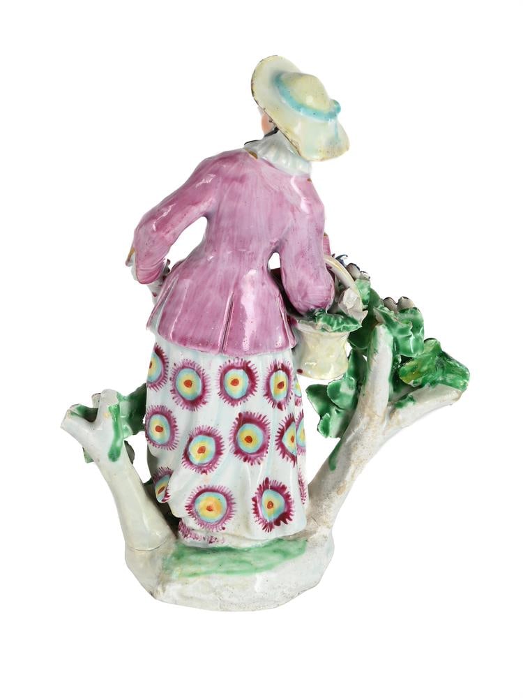 A BOW PORCELAIN MODEL OF A 'FLOWER GIRL', CIRCA 1760 - 2