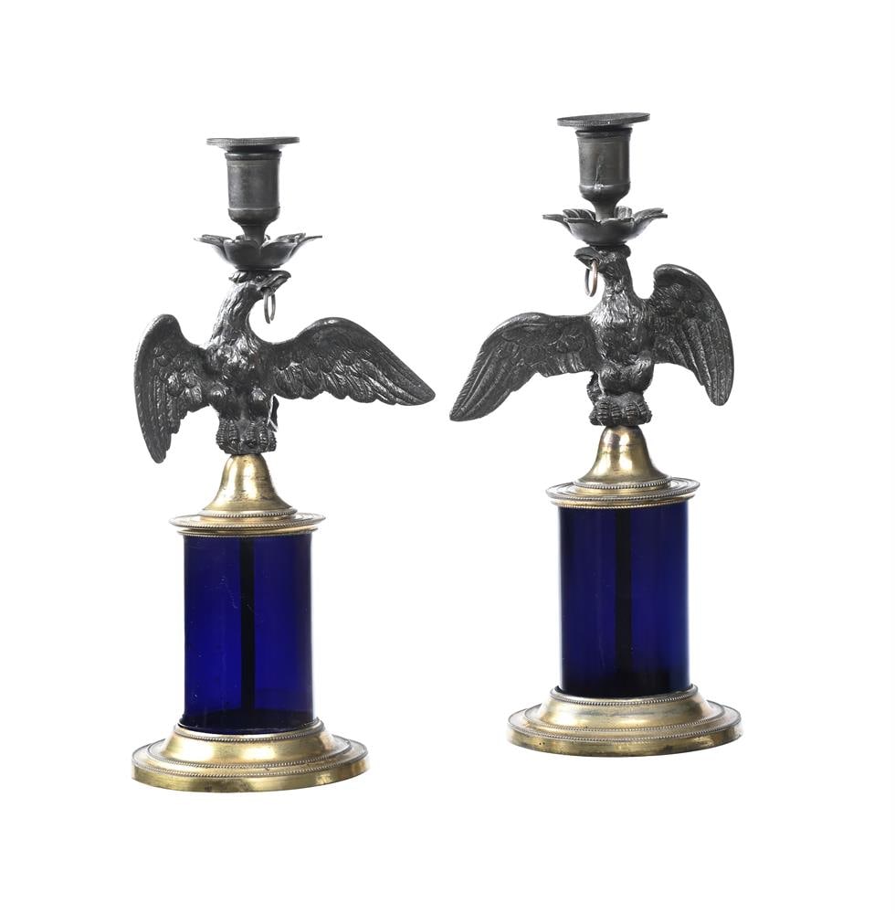 A PAIR OF SILVERED AND BLUE GLASS EAGLE STEM CANDLESTICKS, 19TH CENTURY AND LATER: A PAIR OF SILVERED AND BLUE GLASS EAGLE STEM CANDLESTICKS 19TH CENTURY AND LATER each 28.5cm high, bases 10cm diameter Condition Report: PLEASE NOTE: ALL LOTS ARE LOCATED AT SACKVILLE WEST