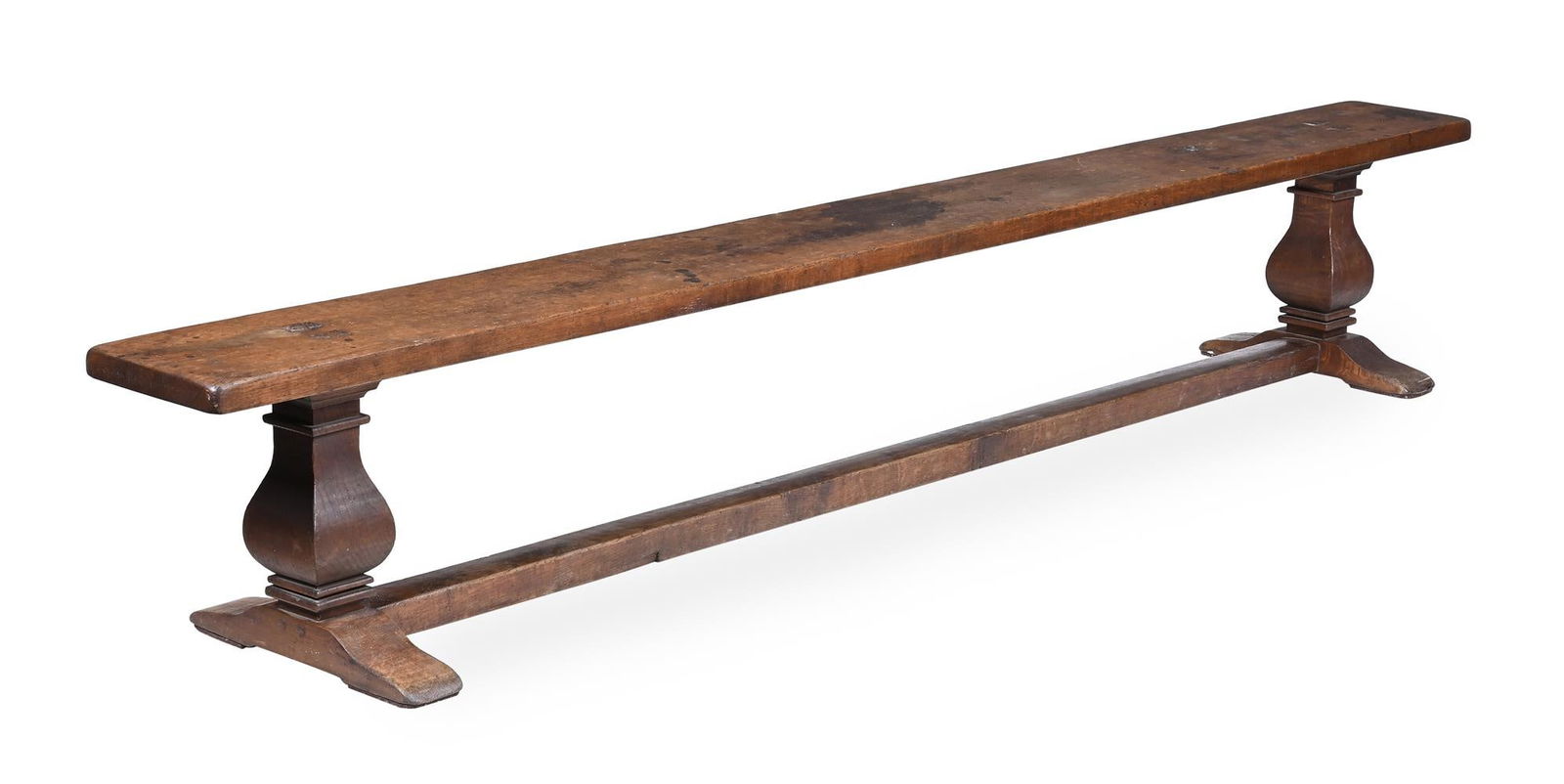 A SET OF FOUR LONG OAK REFECTORY FORMS OR BENCHES, CIRCA 1900 - 2