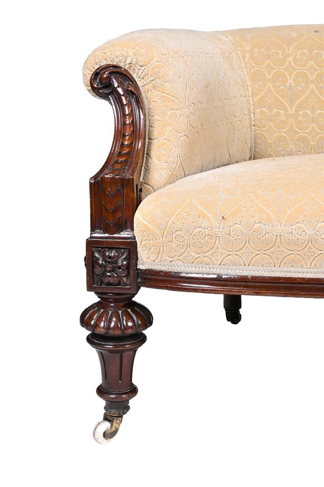 A VICTORIAN CARVED MAHOGANY LOW BACK SOFA, IN THE MANNER OF GILLOWS, CIRCA 1865 - 2
