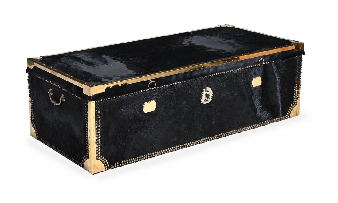 A HIDE COVERED AND BRASS MOUNTED TRUNK, OF RECENT MANUFACTURE: A HIDE COVERED AND BRASS MOUNTED TRUNK OF RECENT MANUFACTURE 39cm high, 121cm wide, 56cm deep Condition Report: PLEASE NOTE: ALL LOTS ARE LOCATED AT SACKVILLE WEST