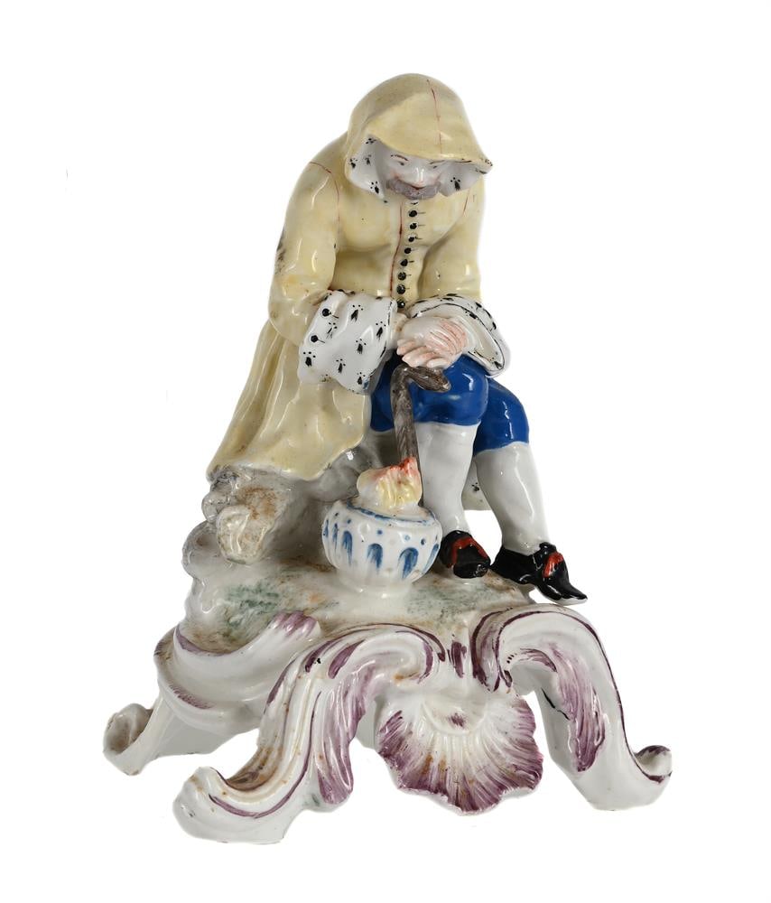 A BOW PORCELAIN MODEL EMBLEMATIC OF WINTER FROM A SERIES OF THE FOUR SEASONS, CIRCA 1765: A BOW PORCELAIN MODEL EMBLEMATIC OF WINTER FROM A SERIES OF THE FOUR SEASONS