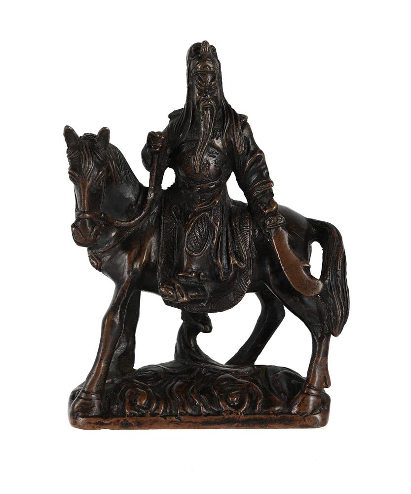A CHINESE BRONZE FIGURE OF GUAN YU ON HORSEBACK, 19TH OR 20TH CENTURY: A CHINESE BRONZE FIGURE OF GUAN YU ON HORSEBACK 19TH OR 20TH CENTURY the legendary warrior holding a sword 15.5cm high, 11cm wide, 5cm deep Condition Report: 