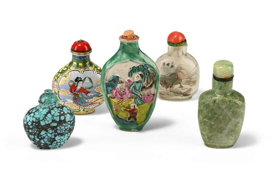 AN ASSORTED GROUP OF CHINESE SNUFF BOTTLES, MOSTLY 20TH CENTURY: AN ASSORTED GROUP OF CHINESE SNUFF BOTTLES MOSTLY 20TH CENTURY Including; a Chinese turquoise snuff bottle and cover, another jadeite snuff bottle (black ring around neck), a reverse
