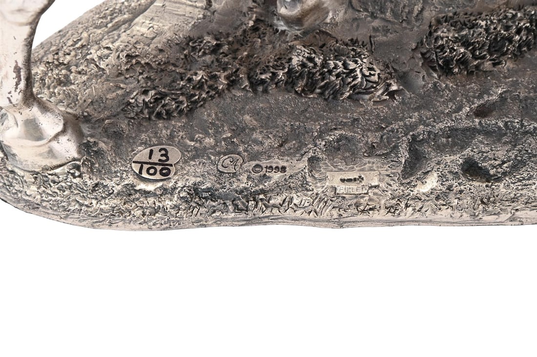 A SILVER-PLATED SCULPTURE OF A MARE AND FOAL, DATED 1998 - 4