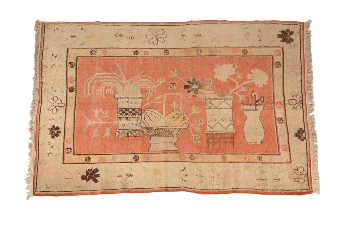 AN INDIAN CARPET OF UYGHUR DESIGN: AN INDIAN CARPET OF UYGHUR DESIGN The field decorated with stylised decoration Approximately 160 x 249cm Condition Report: PLEASE NOTE: ALL LOTS ARE LOCATED AT SACKVILLE