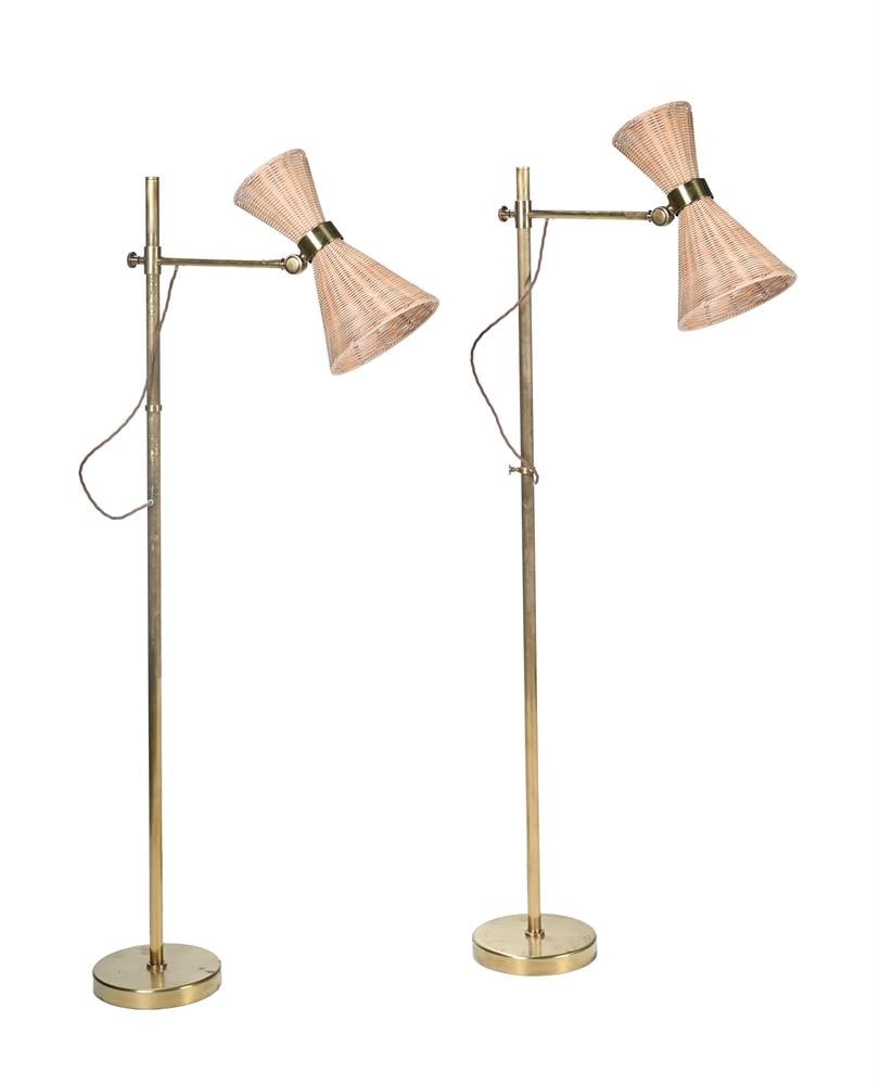 DAVID NETTO FOR SOANE BRITAIN; A PAIR OF TROUSDALE BRASS FLOOR LAMPSS, SECOND HALF 20TH CENTURY: DAVID NETTO FOR SOANE BRITAIN; A PAIR OF TROUSDALE BRASS FLOOR LAMPS SECOND HALF 20TH CENTURY With rattan up-down' shades 150cm high, 42cm length of arm 