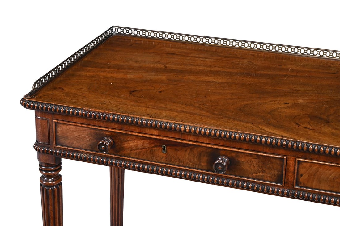 A GEORGE IV MAHOGANY DRESSING OR SIDE TABLE, IN THE MANNER OF GILLOWS, CIRCA 1825 - 2