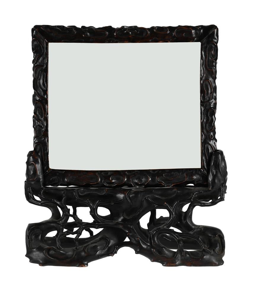 A CARVED CHINESE HARDWOOD TABLE SCREEN FRAME AND STAND, 19TH CENTURY: A CARVED CHINESE HARDWOOD TABLE SCREEN FRAME AND STAND 19TH CENTURY 54cm high x 42cm wide Condition Report: PLEASE NOTE: ALL LOTS ARE LOCATED AT SACKVILLE WEST STORAGE IN ANDOVER (SP10 3SA)