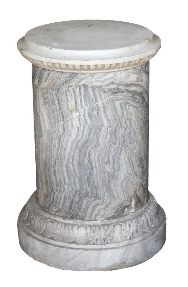 A carved white marble and variegated grey marble p